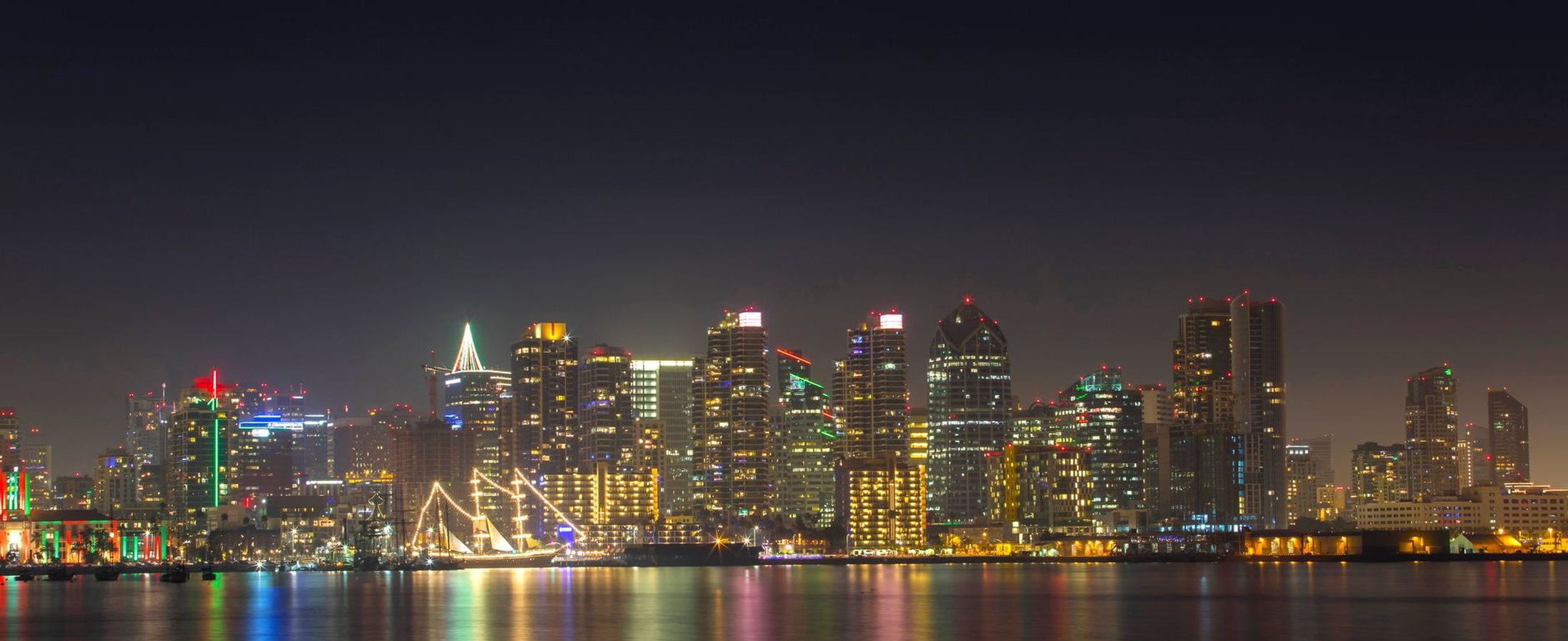 The San Diego skyline over the waterfront at night